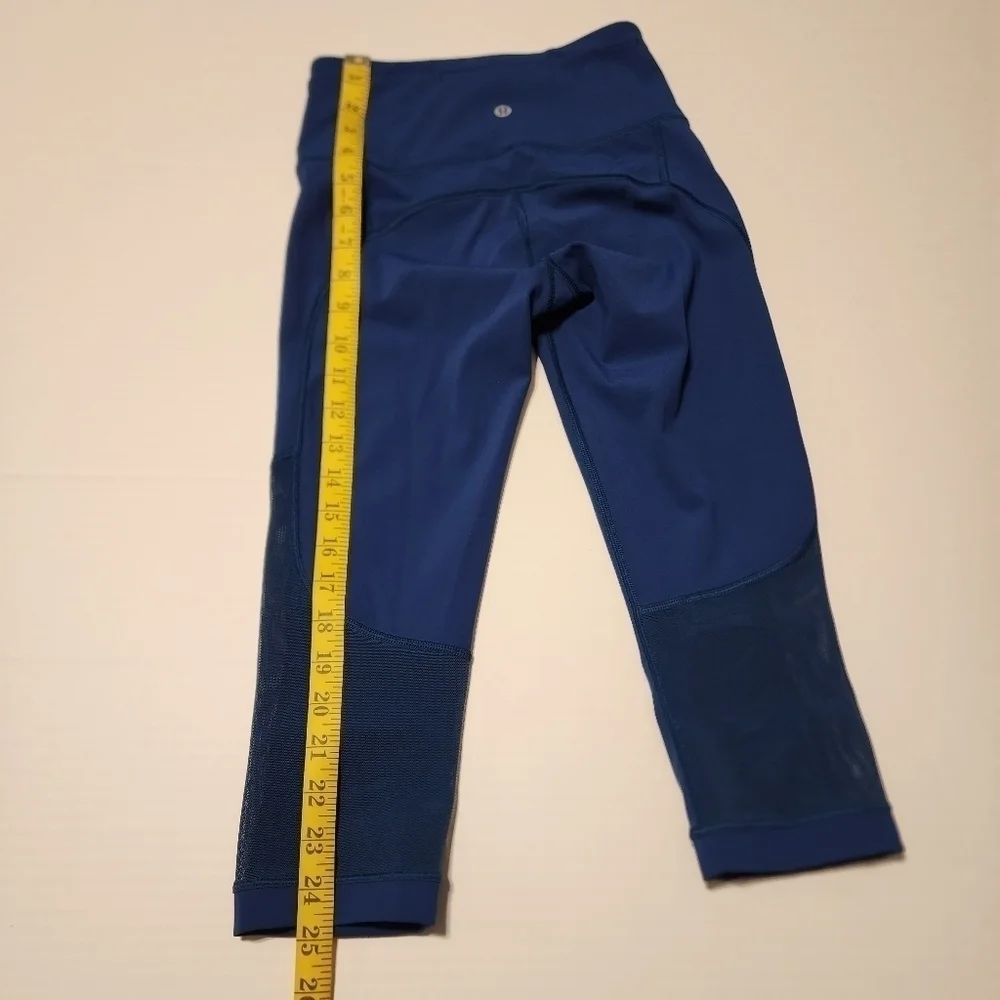 Lululemon size 2 Gear up blue Poseidon cropped leggings with sheer accents